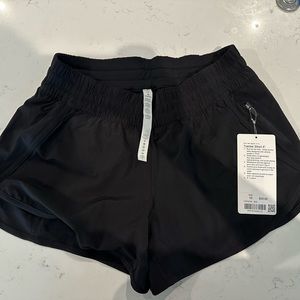NWT Lululemon Tracker Short 4” Black- Size 10